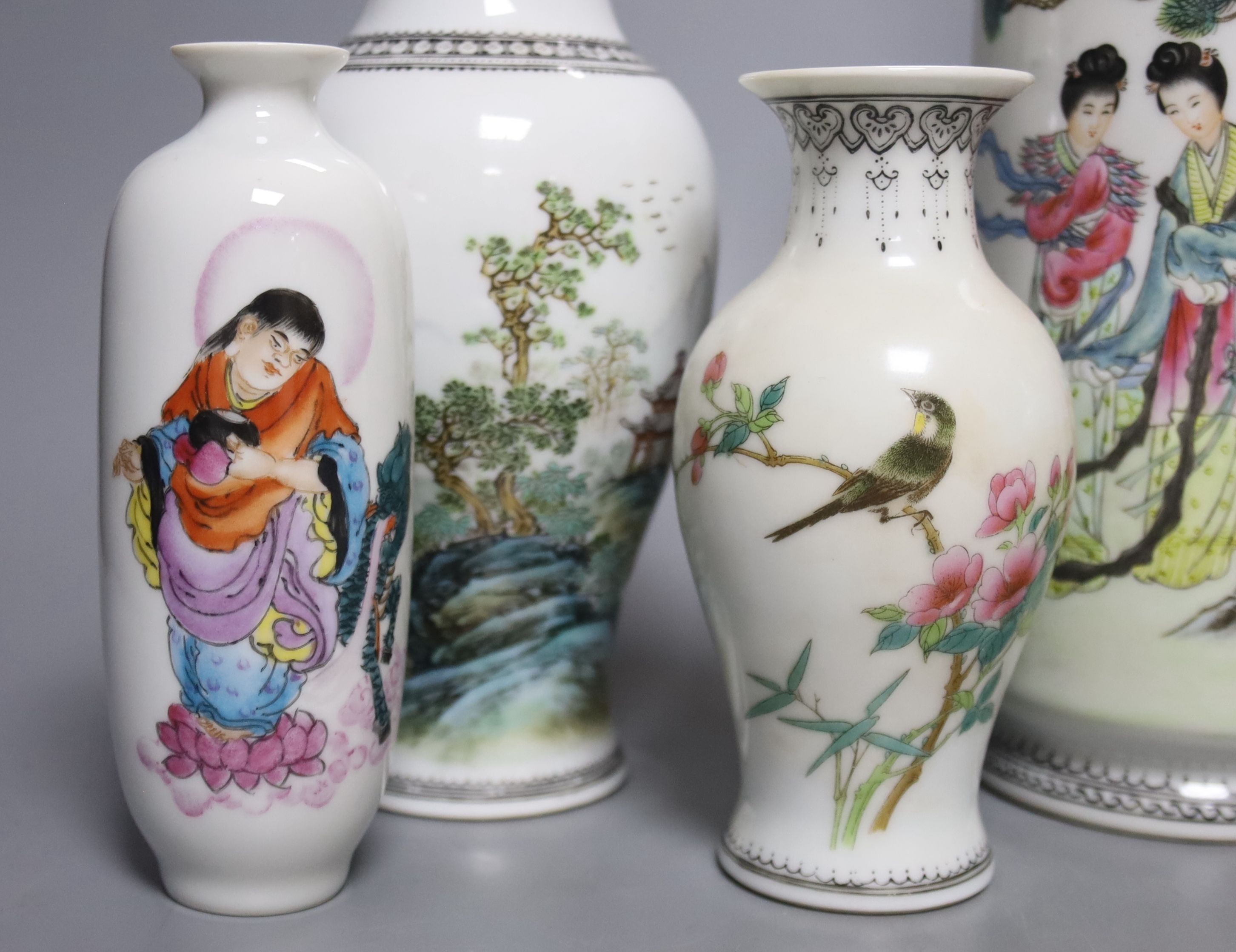 A group of seven Chinese famille rose vases, 20th century